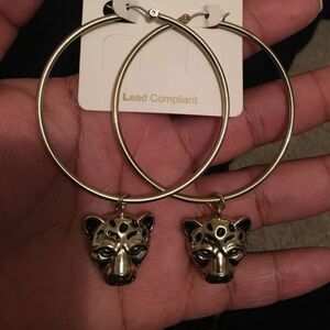 Gold cat hoops.